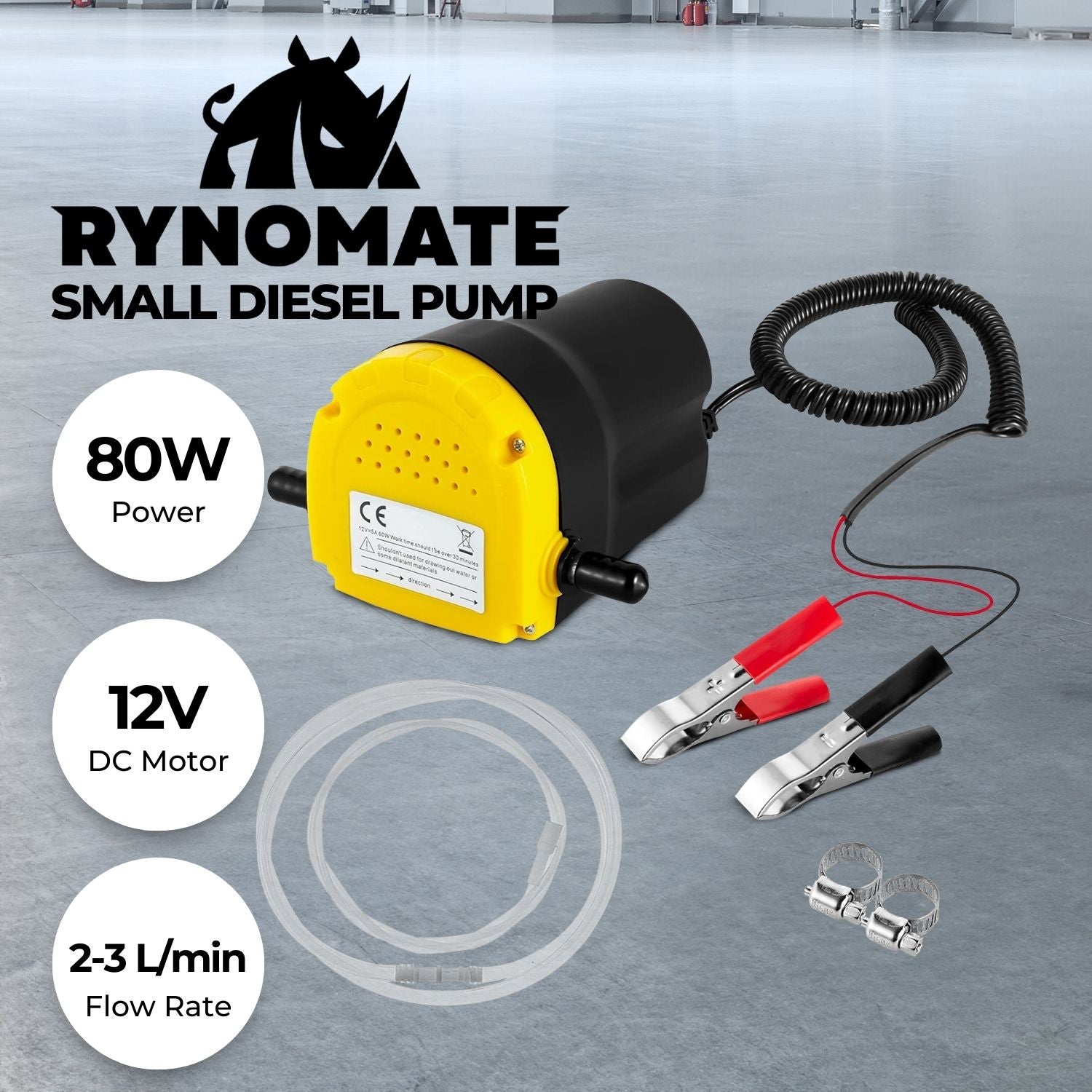 A compact, RYNOMATE 12V Portable Small Transfer Pump for Gear Oil, Lubricant, and Edible Oil Transfer (2-3L/min) RNM-DTP-101-NMS with a yellow body and black casing is connected to a clear hose coiled around it. The durable construction includes a yellow sticker with text and a black power cord. Metal clips and clamps near the pump ensure secure hose connections, optimizing its high flow rate efficiency.