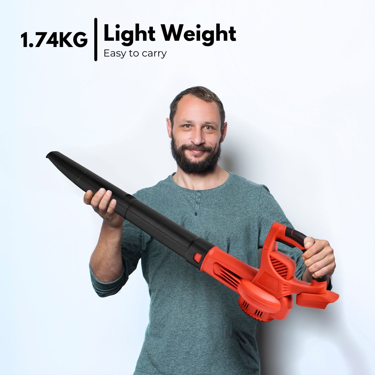 A RYNOMATE 21V Cordless Leaf Blower with Lithium Battery and Charger Kit (Red and Black) RNM-LB-100-RTT is placed on a white background. The device features a long, narrow nozzle and includes a detachable lithium battery pack positioned next to it.