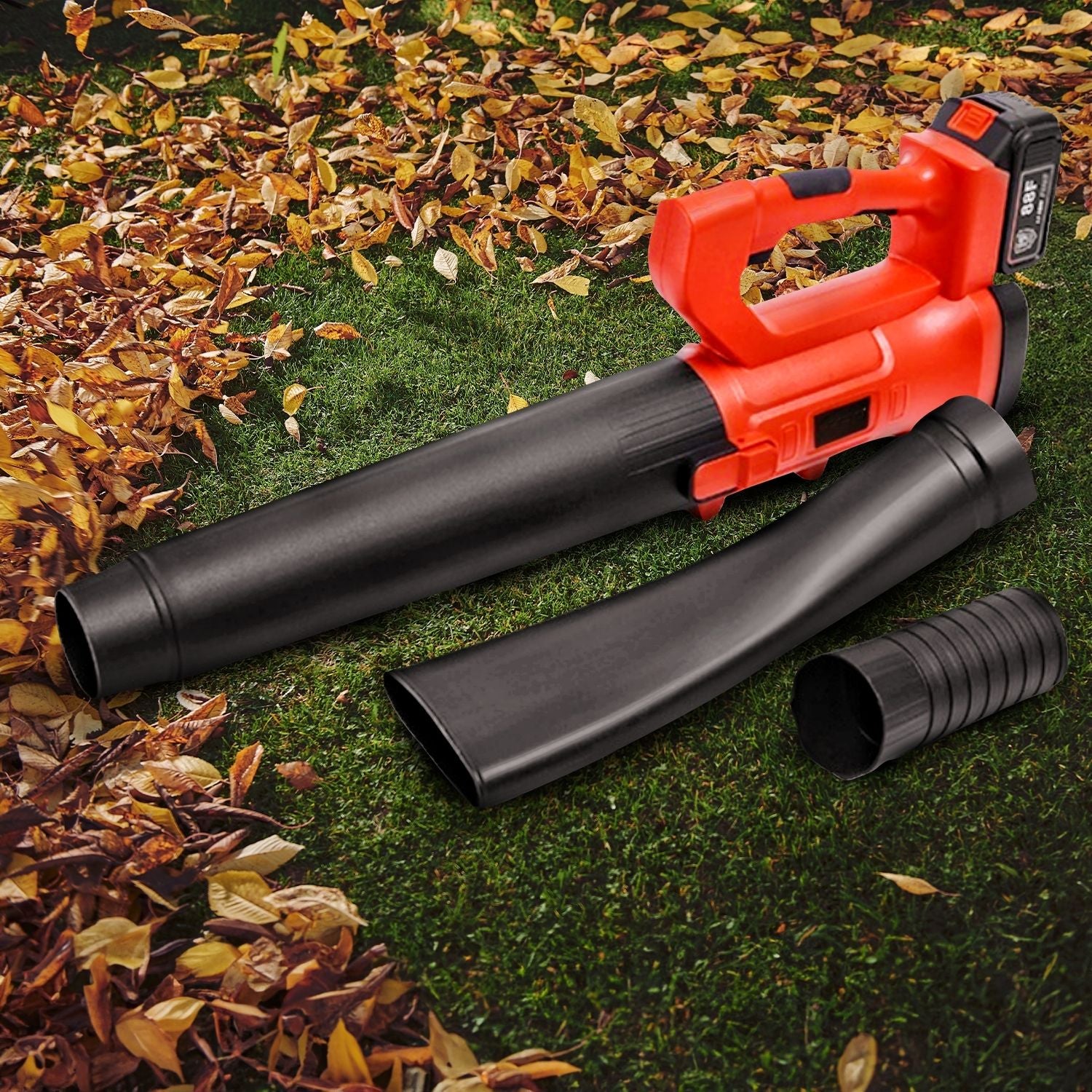 A red and black RYNOMATE 18V Cordless Leaf Blower with Lithium Battery and Charger Kit (Red and Black) RNM-LB-101-RTT is shown against a white background. The blower, featuring an ergonomic handle and an attached rechargeable lithium battery on top, boasts a 6-speed blowing capacity. One nozzle is flat and wide, while the other is round and tapered.