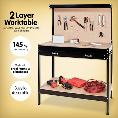 A Kartrite 2-layered Steel Work Bench Garage Storage Table Tool Shop Shelf Pegboard Drawer with a sturdy steel frame, two shelves, and a perforated pegboard back panel. The bench includes a drawer with two handles just below the main work surface. The bottom shelf offers additional tool storage space, making the overall design both functional and durable.