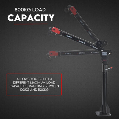 Image of a landscapers tool, an electric pickup crane with a capacity of 800 kg. The swivel crane hoist is mounted on a vertical base with a horizontal arm labeled with increments of 100 kg, 250 kg, and 500 kg. Cables and a control pendant are visible hanging from the arm. Text reads "800kg Electric Hoist Winch Crane 12V Swivel Car Truck UTE Lift 360° Pick Up.