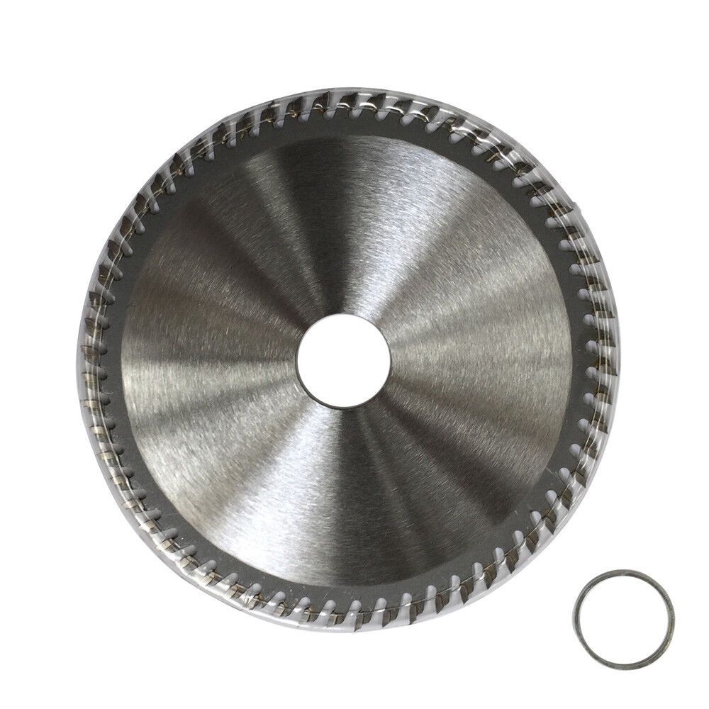 A circular saw blade labeled "125mm 60T Wood Cutting Disc 5.0" TCT Circular Saw Blade ATB 22.2/20 Timber Wheel," designed for wood cutting, with jagged teeth around the edge and a hole in the center. The tungsten carbide tipped blade is accompanied by a smaller ring with inner and outer diameters. The label includes technical details and a QR code.