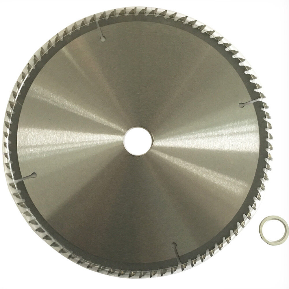 An industrial circular saw blade with sharp, pointed teeth is shown. The 230mm 80T TCT Circular Saw Blade Cutting DISC 9" 25.4/20 1.8mm Aluminium Plastic has a central label with text "WDMATE Australia Seller" and specifications. A smaller metal washer is placed next to it on a white background, ideal for aluminium cutting projects.