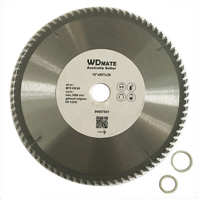 A circular saw blade designed for aluminium cutting with 80 teeth, labeled "250mm 80T Alloy Plastic Circular Saw Blade Cutting Disc 2.0mm 10" TCG 30/25.4mm" in the center. The blade's specifications including diameter (10”), bore size (30mm), and maximum speed (5500 RPM) are printed around the middle. Two circular washers are placed beside the blade.