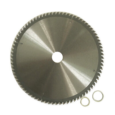 A circular saw blade designed for aluminium cutting with 80 teeth, labeled "250mm 80T Alloy Plastic Circular Saw Blade Cutting Disc 2.0mm 10" TCG 30/25.4mm" in the center. The blade's specifications including diameter (10”), bore size (30mm), and maximum speed (5500 RPM) are printed around the middle. Two circular washers are placed beside the blade.