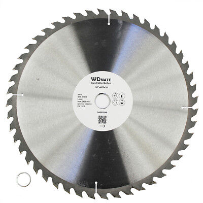 A 400mm 48T Wood Cutting Circular Saw Blade ATB 2.2*16" Cross 30/25.4mm Timber TCT with numerous sharp teeth around its edge is shown. The blade, ideal for cross-cutting tasks, has a label at its center with text including "WD Mate" and technical specifications. Beside the tungsten carbide tipped saw blade on the left side lies a small circular ring.