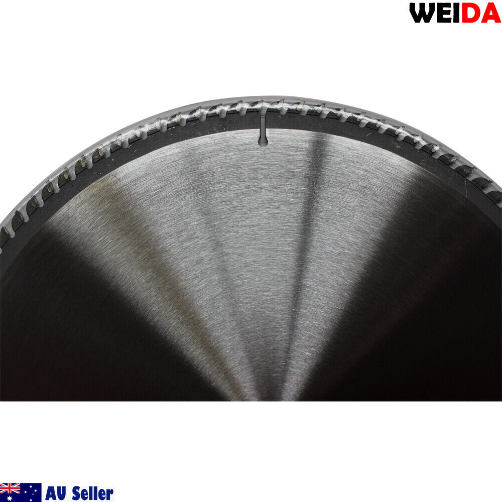 A 350mm 100T Wood Circular Saw Blade Cutting Disc 14" Bore 30/25.4mm K3.5mm Timber, ideal for wood cutting, features a silver, wavy-tooth edge with tungsten carbide-tipped teeth. The packaging details maximum speed, certifications, and includes a QR code. Two rings are shown beside the cutting disc.