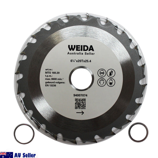 A circular saw blade labeled "2x 160mm Wood Circular Saw Blade Cutting Disc 6-1/4" 20T Bore 25.4mm Kerf 2.5mm," sold by an Australia-based seller. The tungsten carbide tipped blade specifications include 6 1/2 x 20Tx25.4, MTS 160.20, max 9600/min, and compliance with EN 13236. Two metal rings are placed in front of the blade.