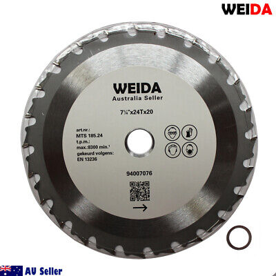 A round 3x 185mm 24T Wood Circular Cutting DiscSaw Blade 7-1/4” Bore 20/16mm Timber Cut with a 7¼ inch diameter, 24 teeth, and a tungsten carbide tipped cutting edge. The blade includes detailed specifications printed on it, such as a maximum speed of 8300 RPM and a 20mm arbor. An additional washer is included alongside visible logos and text.
