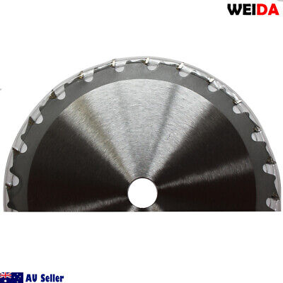 A round 3x 185mm 24T Wood Circular Cutting DiscSaw Blade 7-1/4” Bore 20/16mm Timber Cut with a 7¼ inch diameter, 24 teeth, and a tungsten carbide tipped cutting edge. The blade includes detailed specifications printed on it, such as a maximum speed of 8300 RPM and a 20mm arbor. An additional washer is included alongside visible logos and text.
