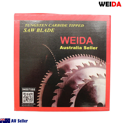 A circular saw blade labeled "3x 254mm Wood Circular Saw Blade Cutting 10’’40T Bore 30/25.4/22.23mm K 2.8mm." This tungsten carbide tipped cutting disc is 10 inches in diameter with 40 teeth. Other specifications include a 30mm arbor. Various certification icons and a QR code are visible on the blade. The image includes two washers placed beside the blade.