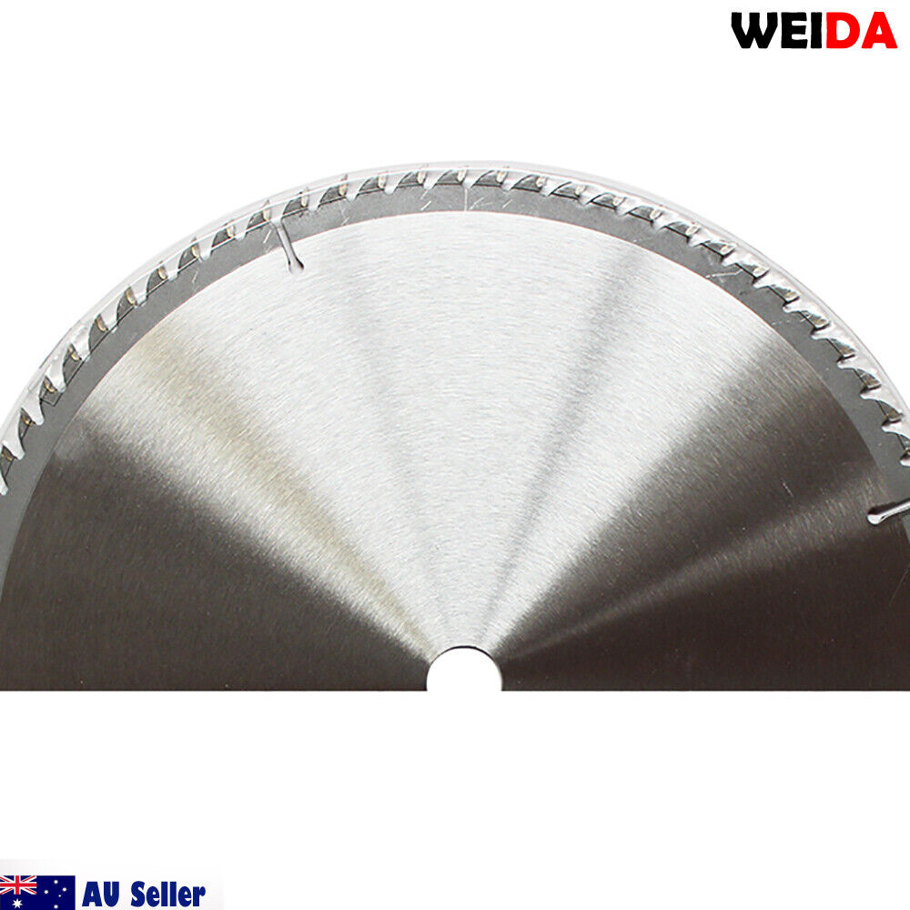 A circular saw blade labeled "WEIDA" with a 14-inch diameter and specifications written on it. Two small circular metal rings are placed below the saw blade. "AU Seller" with an Australian flag is in the bottom left corner and "WEIDA" is in the top right corner. This 350mm Wood Circular Saw Blade Cutting Disc 14’’ 80T Bore 25.4/22.23mm K 3.5mm is tungsten carbide tipped (tct).