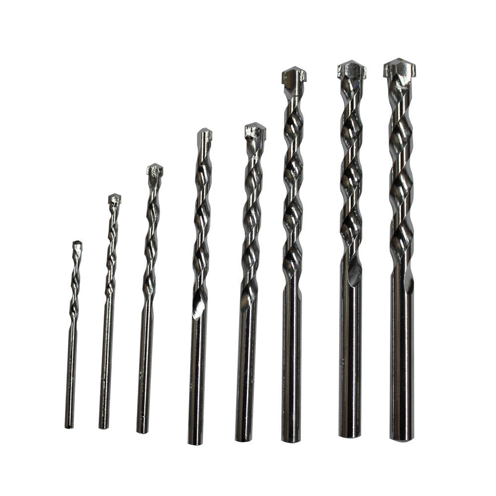 A set of 8pcs Masonry Drill Bit Set 3-10mm Carbide Tip Brick Wall Concrete, featuring durable carbide tips, arranged in a row from smallest to largest. The metal drill bits boast twisted, grooved designs and square tips, set against a white background—perfect construction tools for your project needs.