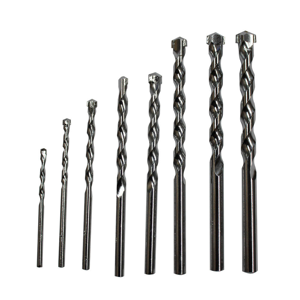 A set of 8pcs Masonry Drill Bit Set 3-10mm Carbide Tip Brick Wall Concrete, featuring durable carbide tips, arranged in a row from smallest to largest. The metal drill bits boast twisted, grooved designs and square tips, set against a white background—perfect construction tools for your project needs.