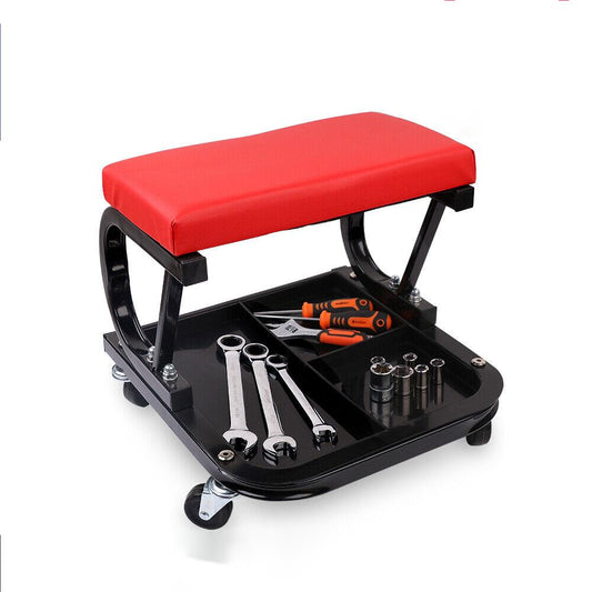 A HORUSDY Rolling Creeper Seat Workshop Mechanic Stool Garage Repair Storage Tray with a red cushioned seat. The stool has a black metal frame and contains a lower compartment divided into sections, holding various tools including wrenches, screwdrivers, and sockets. The HORUSDY Rolling Creeper Seat Workshop Mechanic Stool Garage Repair Storage Tray supports up to 180kg and has four casters for mobility.