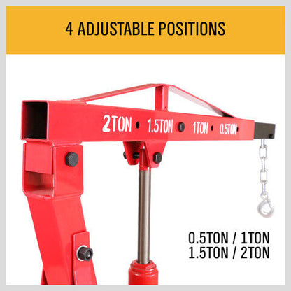 A 2-Ton Hydraulic Engine Crane Foldable Hoist Stand for Mobile Garage Lifting- Workshop Essential with a 2-ton weight capacity icon, featuring a foldable design and six wheels at the base for mobility. The hoist's arm is extended, set against a plain white background. Ideal for automotive and repair shops, this durable crane ensures efficient lifting and maneuverability.