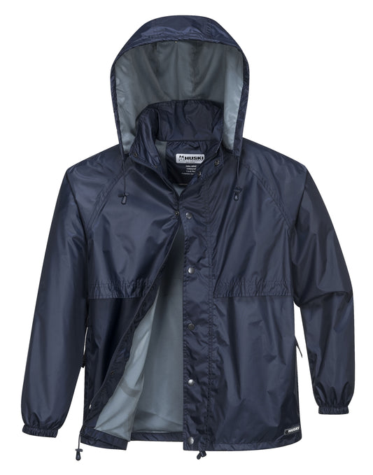 A HUSKI STRATUS RAIN JACKET Waterproof Workwear Concealed Hood Windproof Packable - Navy Blue - M with a front zipper and snaps. This packable jacket features elastic cuffs, a drawstring hood, and two side pockets. The waterproof interior is lined with light grey mesh fabric.