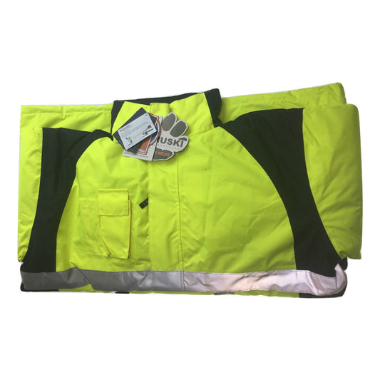 A high-visibility yellow and black waterproof safety jacket with reflective strips, neatly folded and placed on a white background. This HUSKI Miner Hi Vis Waterproof Jacket Industrial Workwear Reflective 918015 - 3XL (117cm) comes with tags that provide detailed product information.