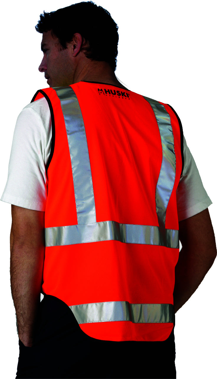 A brightly colored HUSKI Hi Vis Patrol Vest 3M Reflective Tape Safety Workwear High Visibility - Orange - 3XL with silver 3M reflective tape running vertically and horizontally. The vest has a black trim and features a black label with the brand name "Huski" at the bottom.