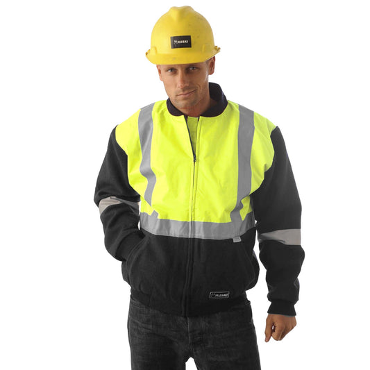 A person wearing a yellow hard hat and a HUSKI Site Mens Hi Vis Wool Blend Bomber Jacket 3M Reflective Tape High Visibility - Yellow/Navy - 4XL stands facing the camera against a plain white background. The individual has hands in pockets and appears to be dressed in work pants.