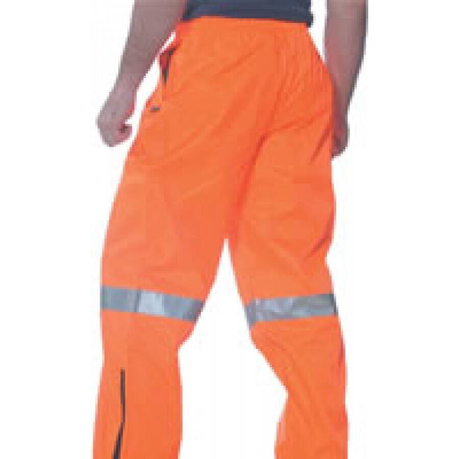 A person wearing bright orange Huski Mens Tarmac Hi Vis Trousers Pants High Visibility Safety Pants - Orange - 5XL (117cm) with reflective stripes around the lower thighs. The person is shown from the back, with visible side pockets and zippers near the ankles of the 5XL pants.