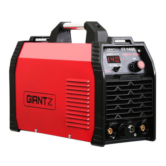 A red and black portable welding machine with a digital display and control knobs on the front, the Giantz 140Amp Inverter Welder Plasma Cutter Gas DC iGBT Portable Welding Machine boasts IGBT DC inverter technology. The model features TIG/MMA/CUT welding capabilities and a handle on top for easy carrying.