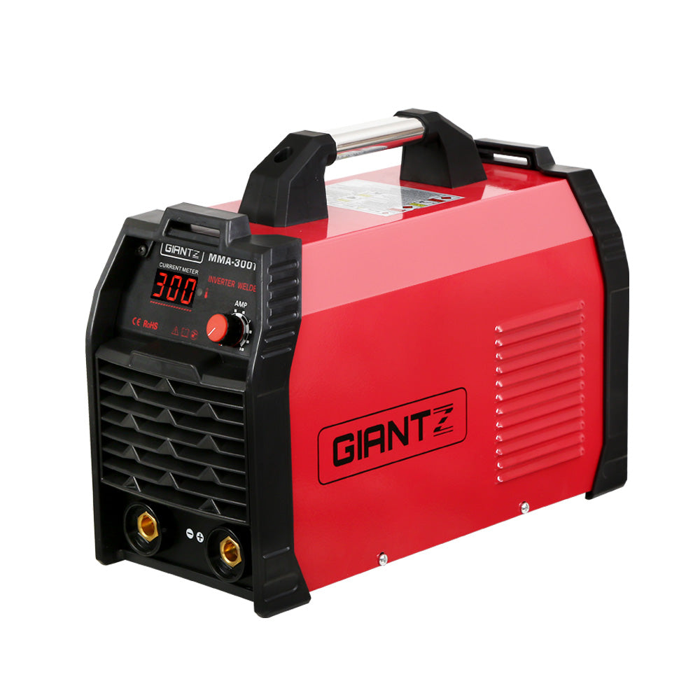 A red and black Giantz 300Amp Inverter Welder MMA ARC iGBT DC Gas Welding Machine Stick Portable featuring IGBT DC inverter technology with a digital display, adjustment knob for adjustable output current, and connectors on the front panel. It has a sturdy handle on top for easy carrying. The model label reads "Gintz MMA-300T" on the front.