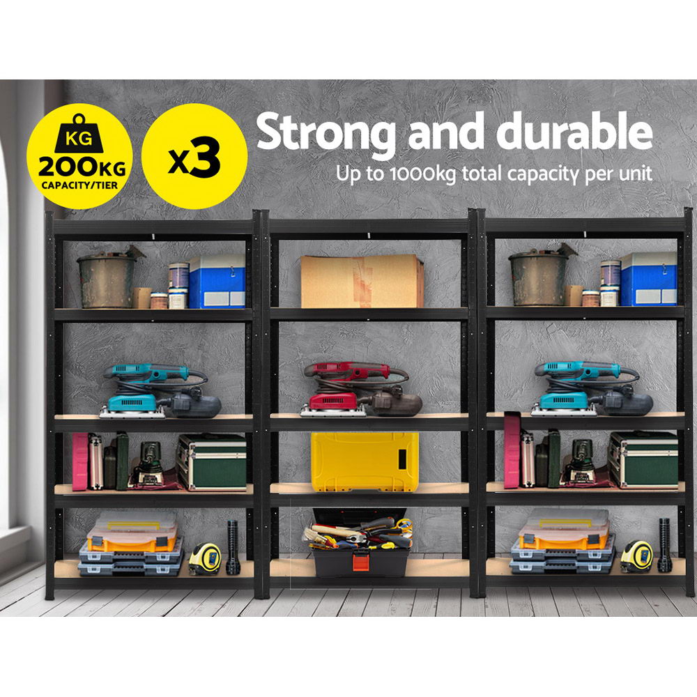 Three black **Giantz 3x1.8M Garage Shelving Warehouse Rack Pallet Racking Storage Shelf Black** units with multiple wooden shelves are arranged side by side, with the one on the right positioned at a slight angle. Each heavy-duty shelving unit has five adjustable beam shelves, offering ample storage space. The background is plain and unobstructed.