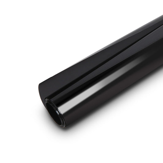 A rolled-up sheet of Giantz Window Tint Film Black Roll 5% VLT Home 100cm X 30m Tinting tools Kit is placed on a white background. The film appears glossy and reflective, highlighting its light-blocking properties and UV resistance. This essential component of any window tinting kit offers added heat insulation for your space.